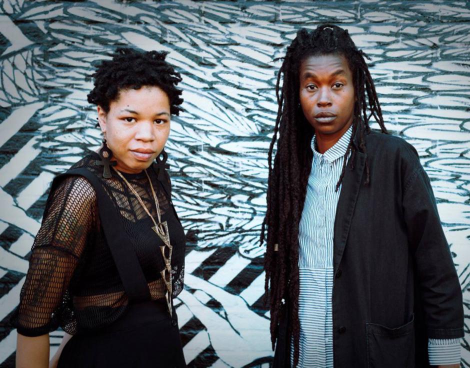 Camae Ayewa and Rasheedah Phillips in front of a patterned background