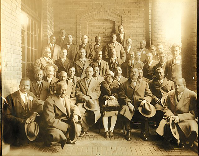 sepia photo of group of men