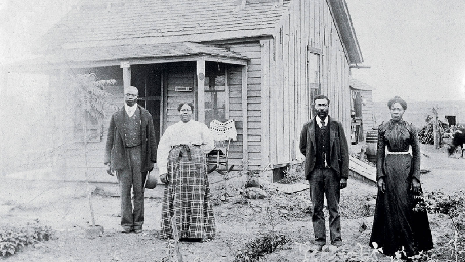 Nicodemus farmers Perry and America Bates (on the left) and their children James and Martha.