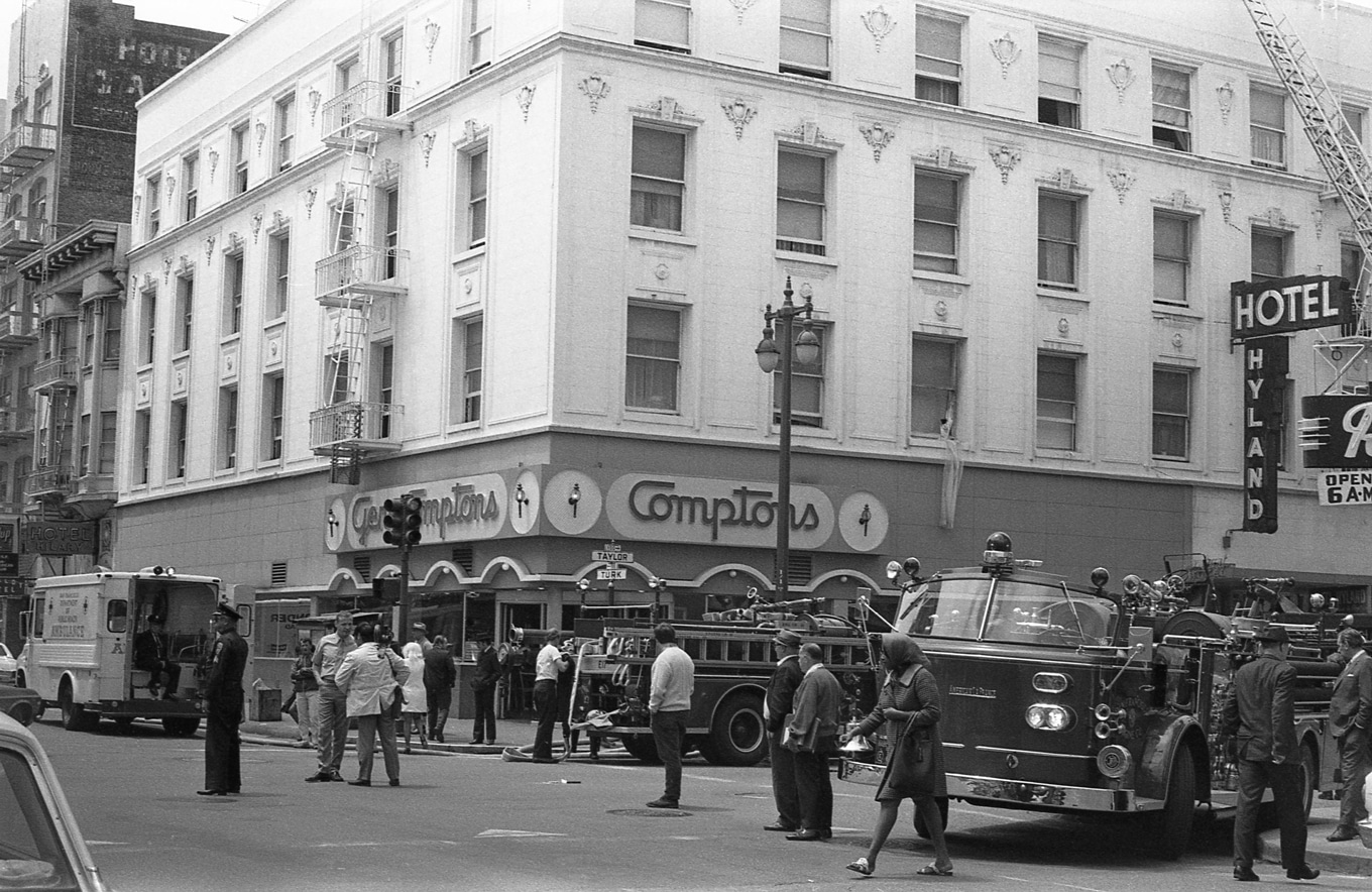 The only known photo of 101–121 Taylor Street with signage for Gene Compton’s Cafeteria fully visible. Taken in aftermath of a fire at the Hyland Hotel, 1970. [© Clay Geerdes, courtesy Tenderloin Museum]