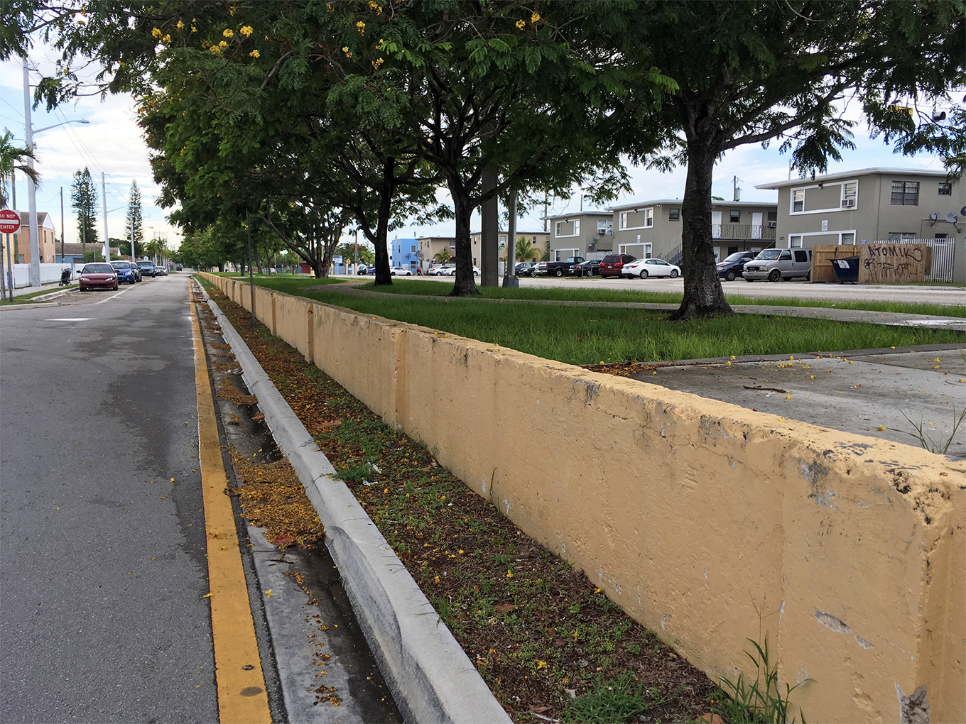 Remnants of a segregation wall in the Liberty City neighborhood of Miami, built in the late 1930s to separate a newly constructed Black-only public-housing development from a white neighborhood, 2018. [Chat Travieso]