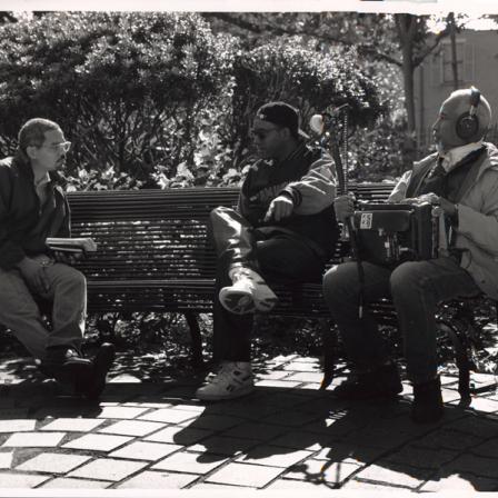 men sitting in a park