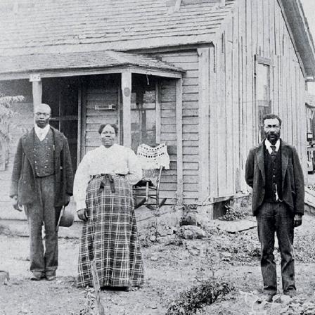 Nicodemus farmers Perry and America Bates (on the left) and their children James and Martha.