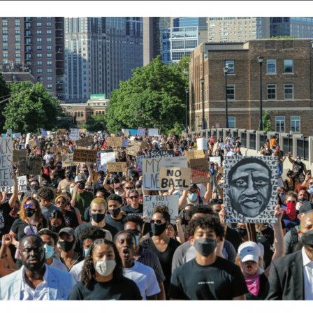 On June 5, thousands of protesters marched from downtown Minneapolis (above) to the site of George Floyd’s arrest. A 1936 photograph shows the NAACP’s flag (bottom) flying over Fifth Ave.